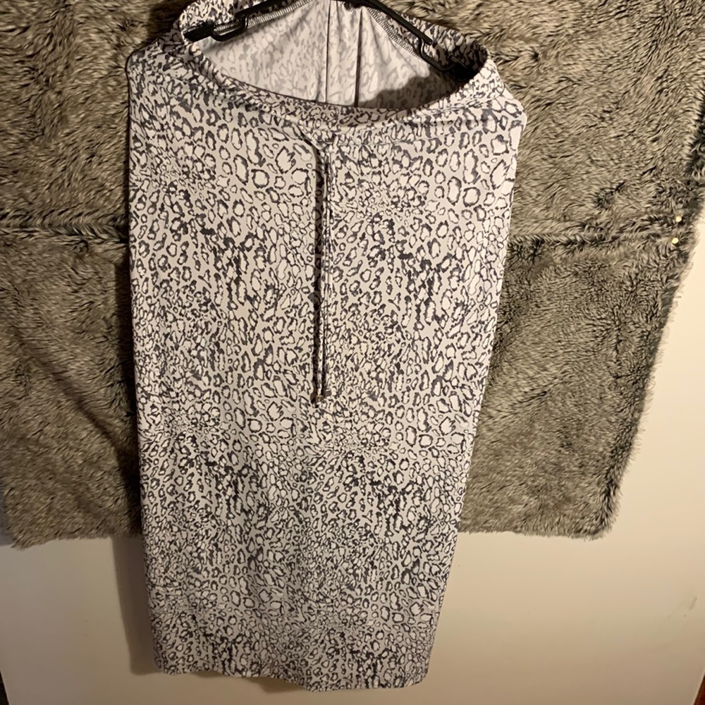 Michael Michael Kors, maxi skirt, size small, 94% polyester, 6% elastic cheetah